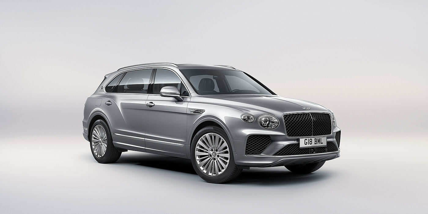 Bentley Stockholm Bentley Bentayga Extended Wheelbase luxury SUV front three quarter view in Moonbeam paint with 21 inch five spoke painted wheels