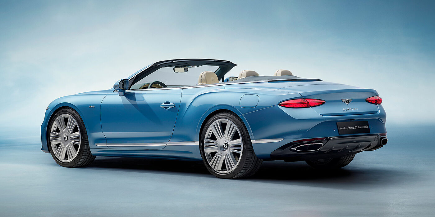 Bentley Stockholm New Bentley Continental GTC Azure convertible rear view in Light Windsor blue paint with 22 inch ten spoke wheels and chrome exterior details