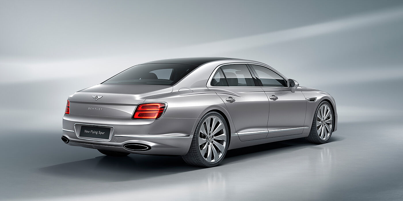 Bentley Stockholm New Bentley Flying Spur sedan rear view in Silverlake paint with ten spoke wheels and chrome matrix grille