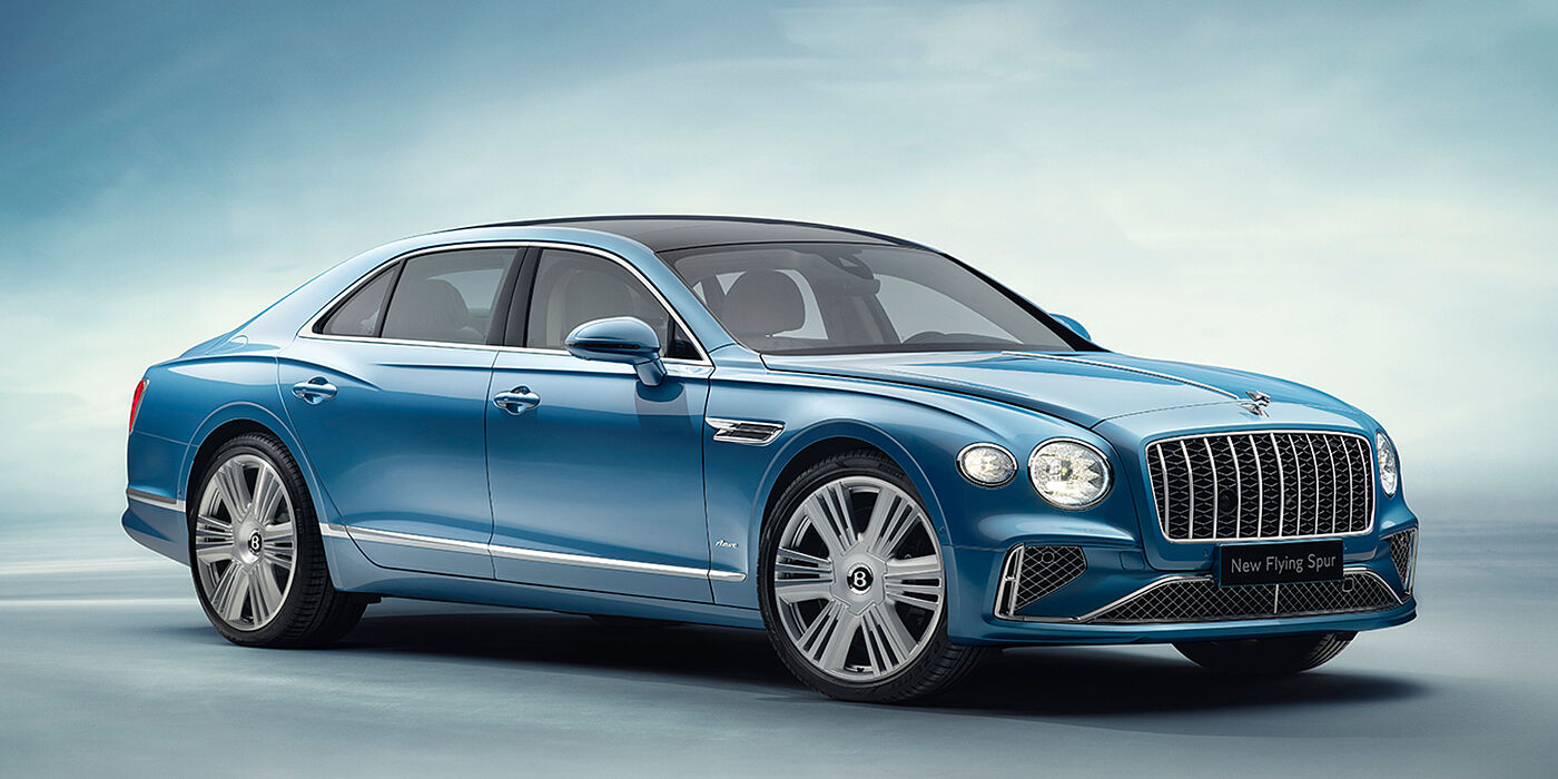 Bentley Stockholm New Bentley Flying Spur Azure sedan front view in Light windsor blue by Mulliner paint with 22 inch Azure wheels and chrome exterior details